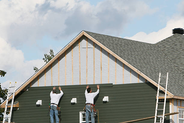 Professional Siding Installation technician working in Olanta, PA